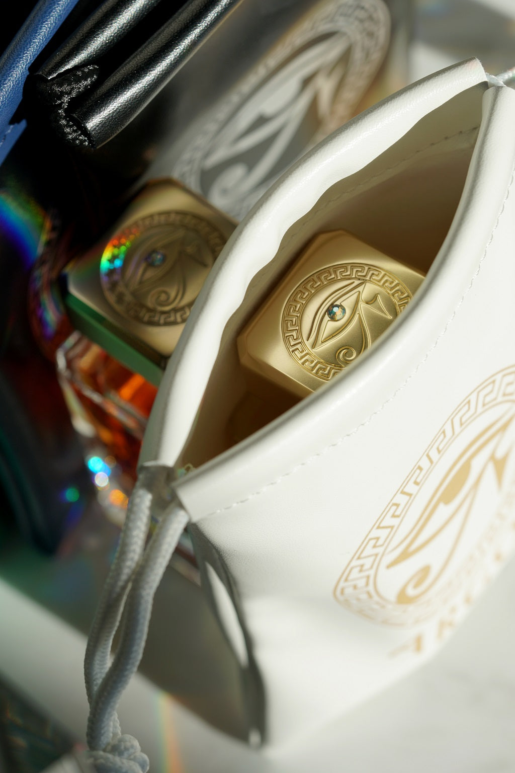 Argos Genuine Leather Bag white with gold name design having a perfume bottle inside front straight look another angle