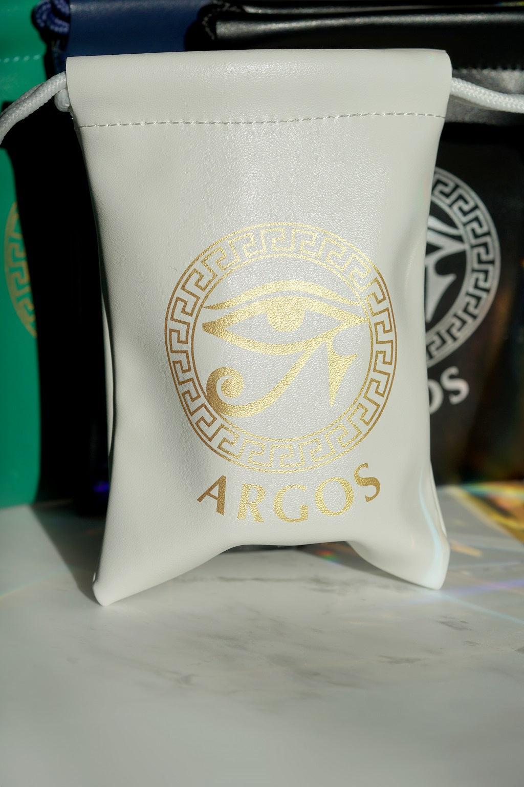 Argos Genuine Leather Bag white with gold name design having a perfume bottle inside front straight look.