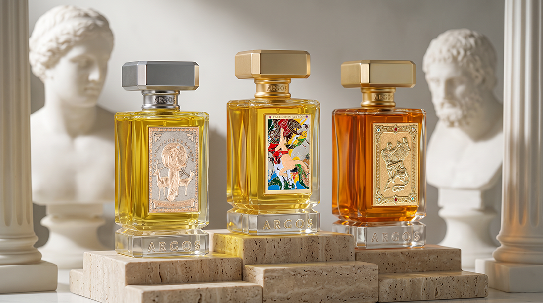Three Argos Fragrances bottles, Nemean Lion, Brivido Della Caccia, and Fall of Phaeton, arranged on a dark marble surface