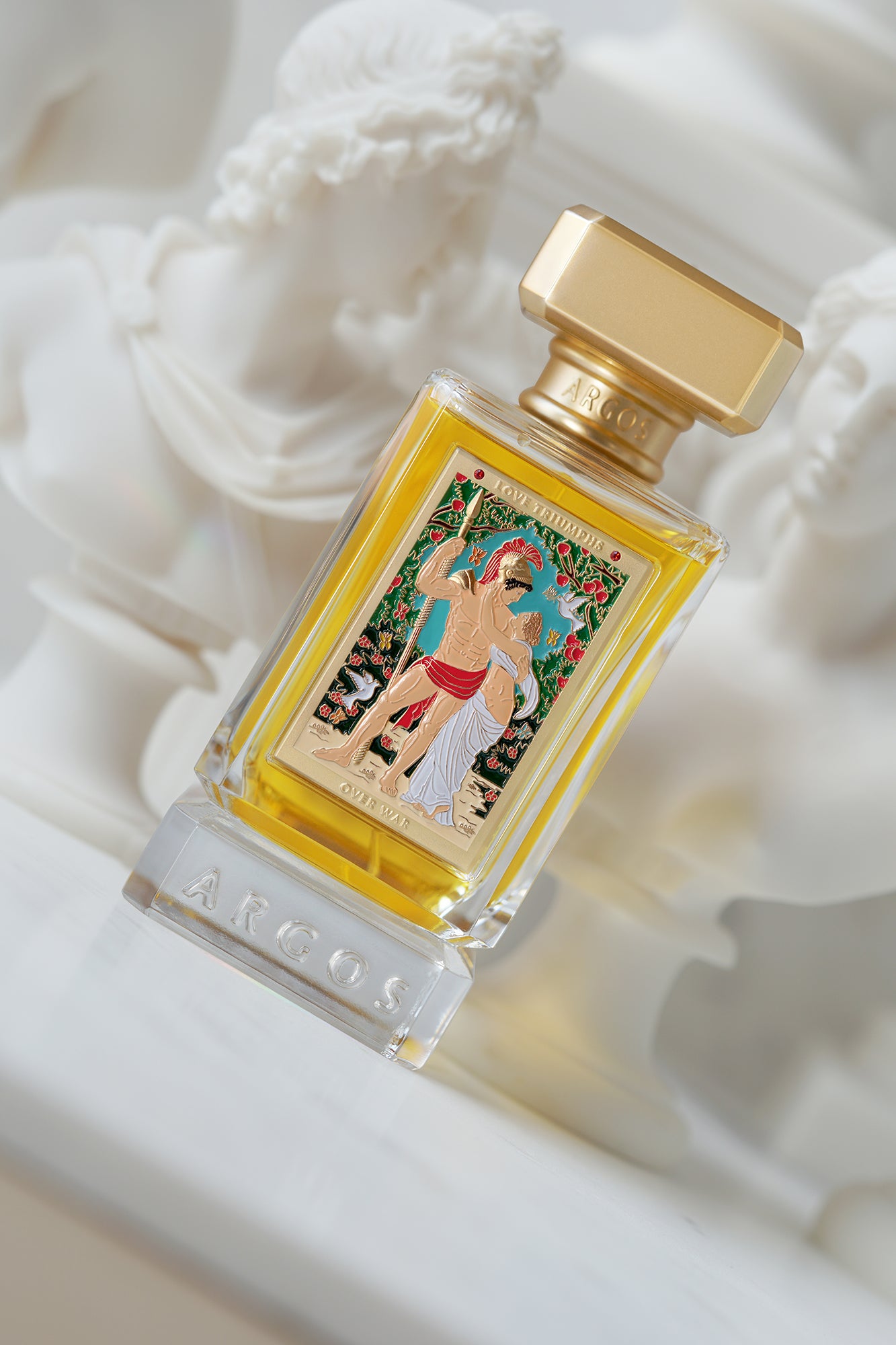 Argos Love Triumphs Over War 100ml Bottle Cross Front View Candid