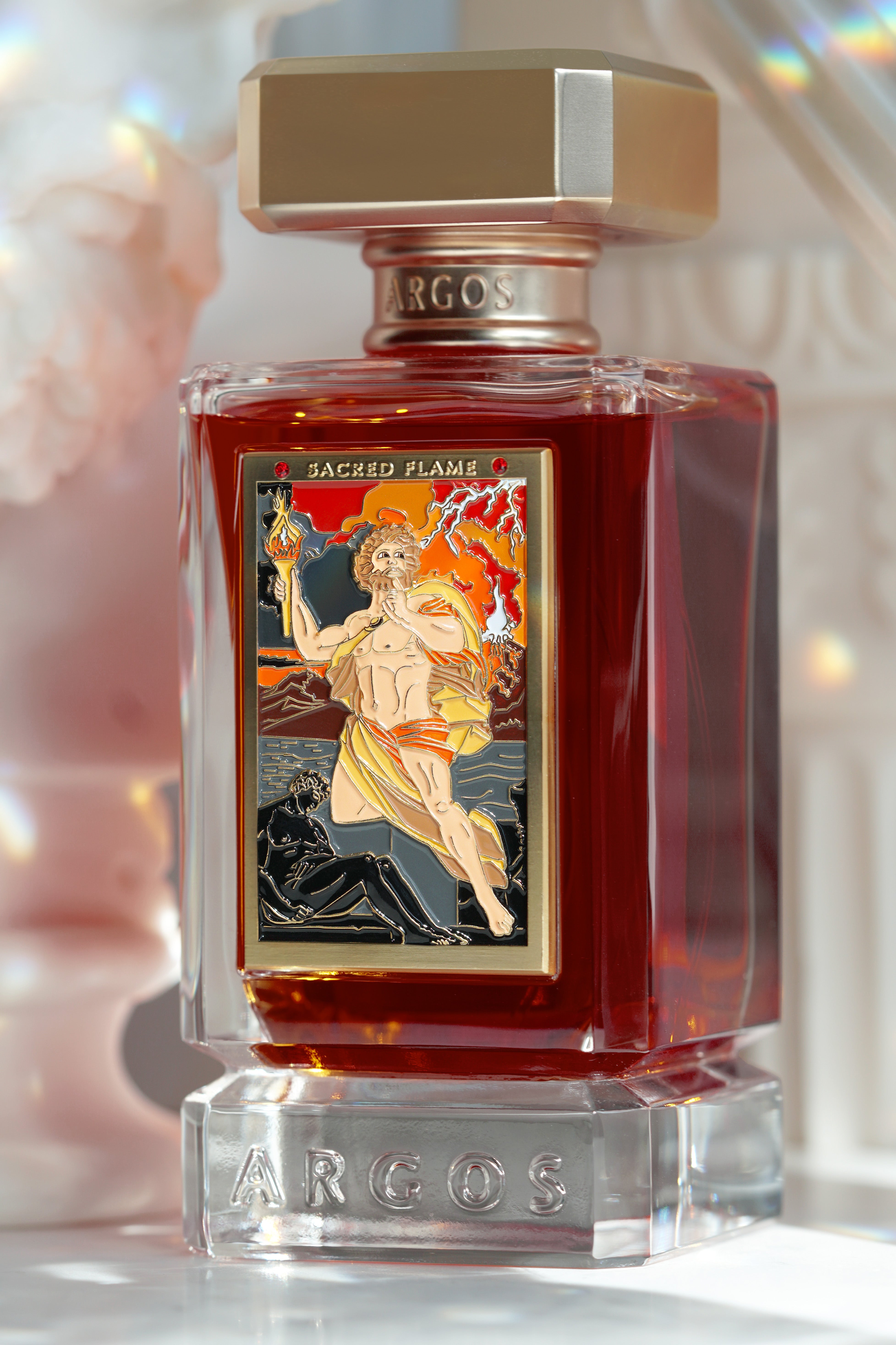 Top view of Sacred Flame by Argos showcasing the gold cap and bottle design.